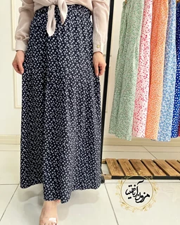 دامن زنانه نیم کلوش مشکی طرح گلدار ریز سفید گلزار