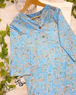 تونیک نخی آستین پاگن دار آبی روشن طرح برگ و گلبرگهای ریز هاویر