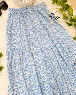 دامن زنانه نیم کلوش سفید طرح گلهای آبی گلزار
