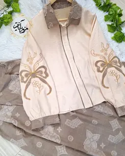 ست شومیز و دامن گلدار ون کلیف کرم خاکی طرح گلدوزی پاپیونی