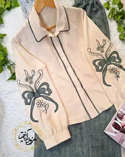 ست شومیز و شلوار بگ نسکافه ای سبز طرح گلدوزی پاپیون