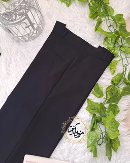 شلوار زنانه مشکی طرح نیم بگ وانیا