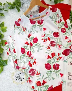 شومیز آستین واشری سفید طرح انار با ریسه برگ سبز هانار