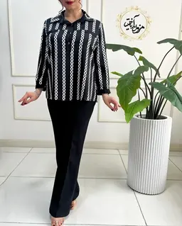 شومیز آستین پاگن دار مشکی سفید طرح سه دکمه زنجیری مهوین