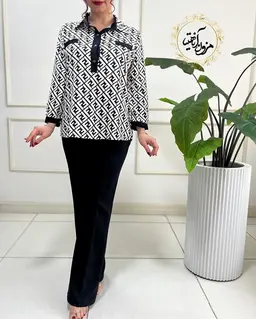 شومیز آستین پاگن دار مشکی سفید طرح سه دکمه فندی آرام