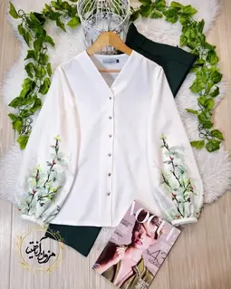 شومیز آستین پفی سفید طرح برگ و گلبرگ سبز پلین