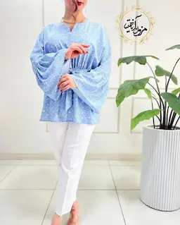 شومیز آستین کلوش آبی روشن طرح گلهای مهیاس