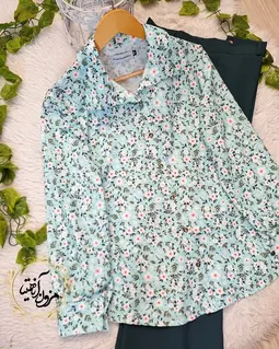 شومیز نخی جلو دکمه سبز آبی طرح شکوفه های سفید داگل