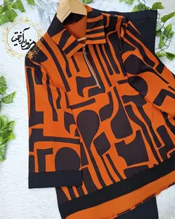 شومیز نیم زیپ مشکی نارنجی طرح هندسی 