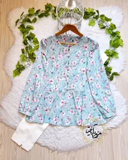 شومیز پایین کلوش آبی پاستیلی طرح شکوفه ها صورتی جواهر