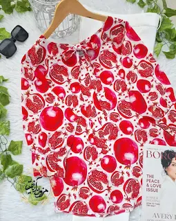 شومیز یقه پاپیونی سفید طرح انار قرمز نیمه پینار