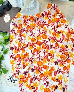 شومیز یقه پاپیونی سفید طرح کدو برگ نارنجی پگاه