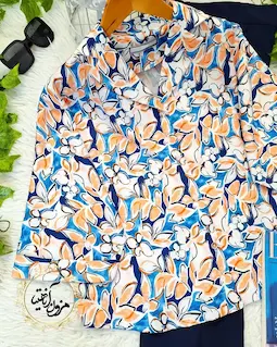 شومیز یقه کتی سفید طرح برگ و گلهای سرمه ای نارنجی چیدا
