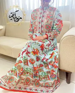 پیراهن ساحلی آبی نارنجی طرح برگ و گلبرگ رامک
