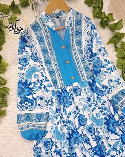پیراهن ساحلی جلو حاشیه سفید آبی آسمانی طرح برگ و گلبرگ تبسم