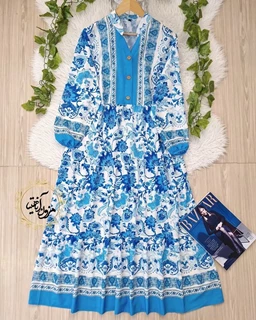 پیراهن ساحلی جلو حاشیه سفید آبی آسمانی طرح برگ و گلبرگ تبسم