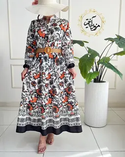پیراهن ساحلی سبز و نارنجی طرح برگ و گلبرگ ویانا