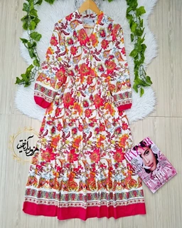 پیراهن ساحلی سفیدسرخابی طرح برگ و گلبرگ حاله