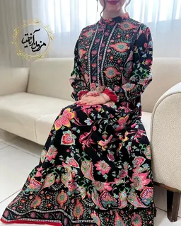 پیراهن ساحلی مشکی طرح برگ و گلبرگ رنگی الینا