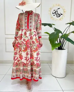 پیراهن ساحلی کرم مرجانی طرح برگ و گلبرگ آدرینا
