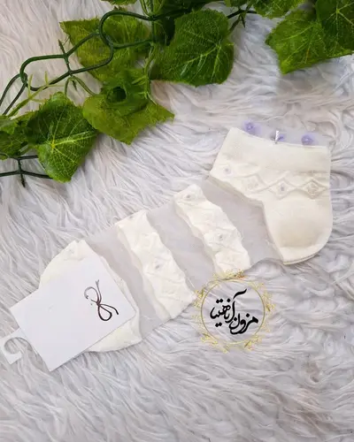 جوراب زنانه سفید طرح سه راه توری گل بنفش