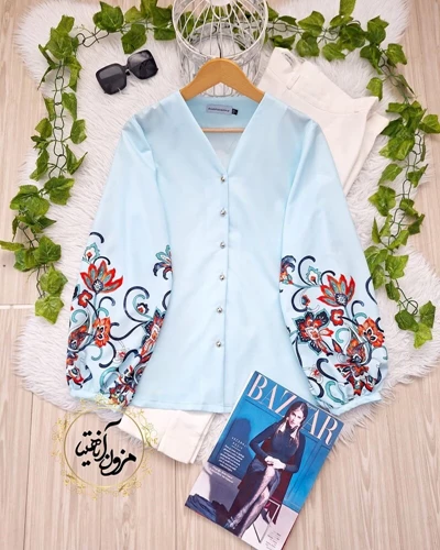 شومیز آستین پفی آبی طرح آستین با گلهای سنتی رایکا سایز-2-تخفیفی