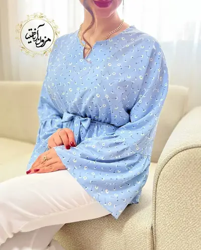 شومیز آستین کلوش آبی روشن طرح گلهای مهیاس