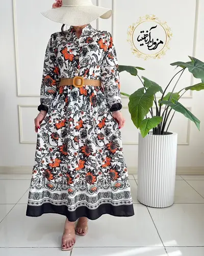 پیراهن ساحلی سبز و نارنجی طرح برگ و گلبرگ ویانا