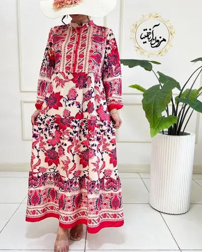 پیراهن ساحلی کرم سرخابی طرح برگ و گلبرگ آرشیت