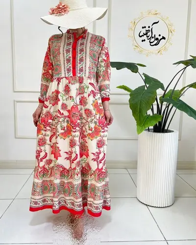 پیراهن ساحلی کرم مرجانی طرح برگ و گلبرگ آدرینا